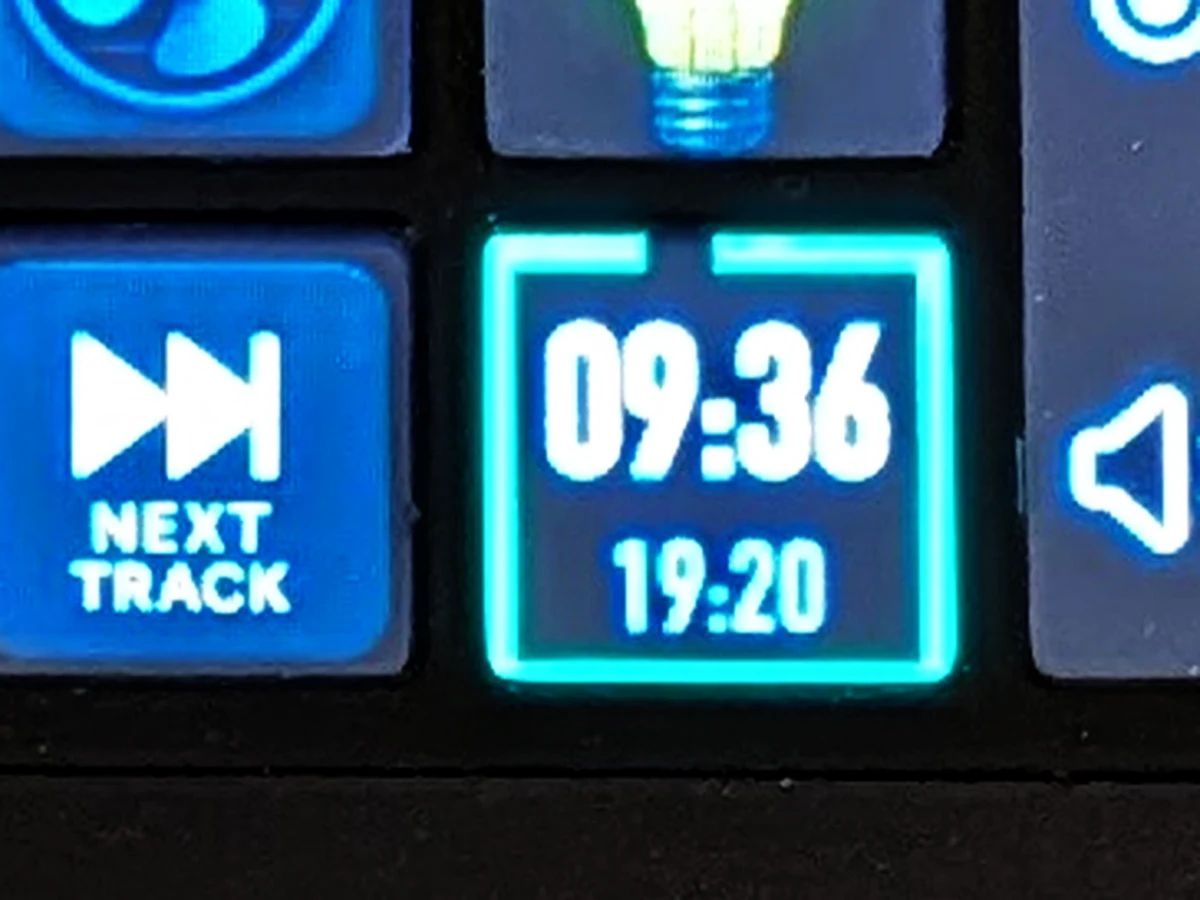 The Pomodoro key on the Loupedeck, mid-session. The countdown reads 09:36 in large white digits with the wall clock, 19:20, underneath, and a glowing border runs around the edge of the key with a small gap at the top where the time has already drained away.